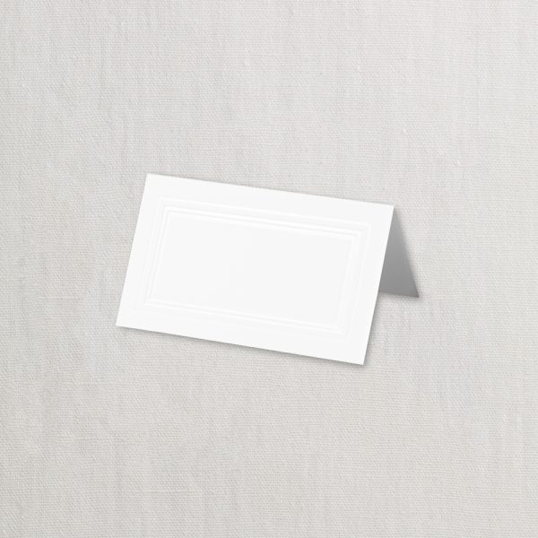 Pearl White Triple Debossed Cotton Place Cards Elevate your table setting with the understated luxury of our triple debossed place cards. Crafted from world-class 100% cotton paper with a refined Pearl White Kid Finish, these cards make a simple yet sophisticated statement at any social event, wedding, or formal party. Exquisite Craftsmanship Each card features a distinctive triple debossed border that creates a beautiful, recessed frame around your guests' names. This "paralyzed" border adds a tactile depth and architectural feel that only premium debossing can achieve. Professional Quality 100% Cotton Fiber: Provides a soft, fabric-like feel and superior durability compared to standard paper. Pearl White Kid Finish: A smooth, matte surface that is perfect for professional calligraphy or DIY printing. 64 lb. Weight: Specifically chosen for its elegance and ability to hold a crisp, clean fold. The perfect finishing touch for the host who values tradition and quality. These cards ensure your event organization is as beautiful as it is functional.