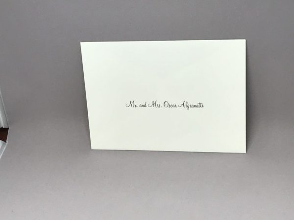 Save time by opting for calligraphy envelope guest addressing with your order, featuring guest addressing tailored to match your unique style. This ensures that upon receiving your invitations, they will be ready for mailing, complete with addresses professionally printed directly onto your envelopes. The font and color will seamlessly match your invitations, creating a cohesive theme, unless you specify changes to the color or fonts. Select your desired quantity, customize your envelope online, and complete your order. Email us your guest addressing list file, and we'll create a layout for your approval. Upon receiving the layout, carefully review it and make any necessary changes or corrections.