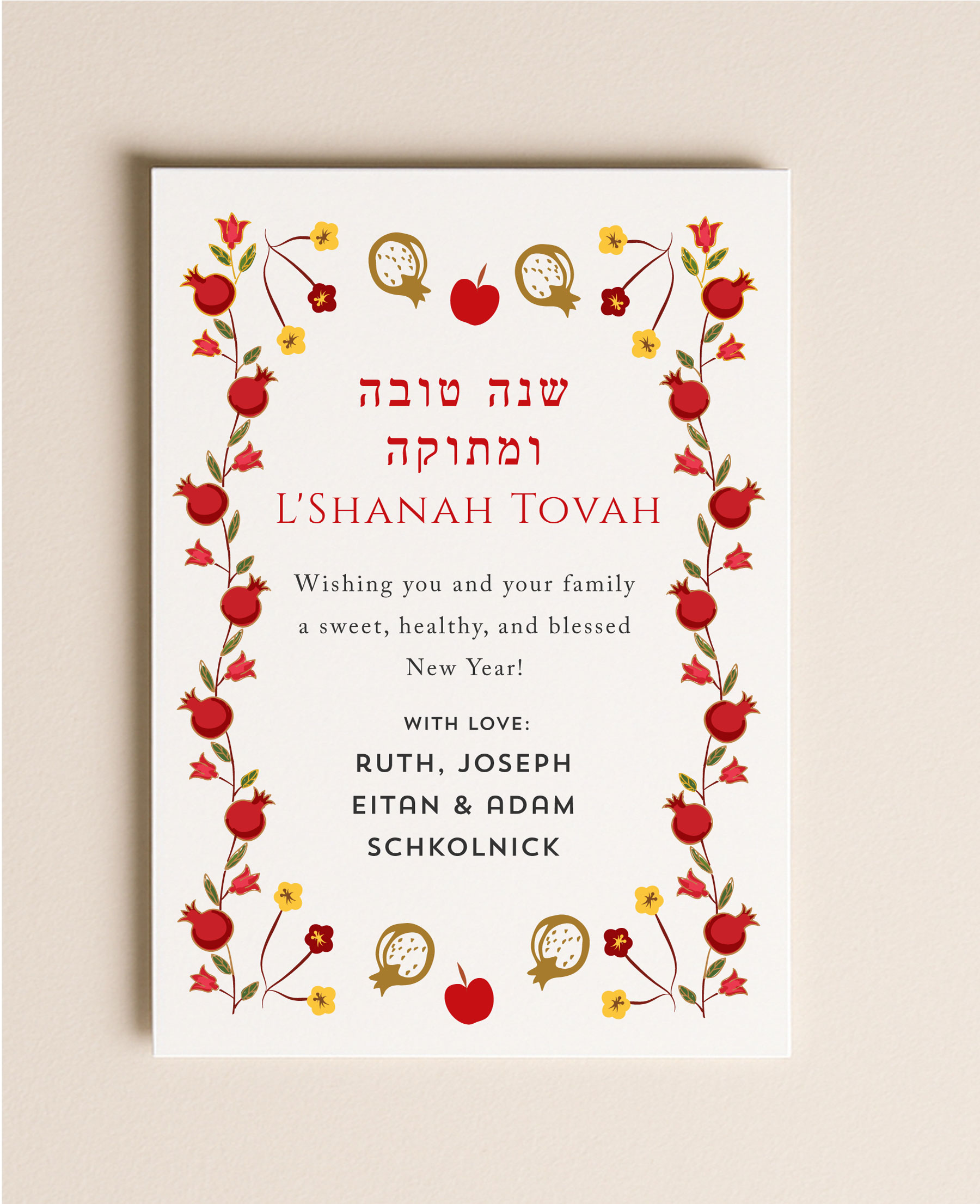 5x7 Rosh Hashanah flat card featuring a red pomegranate and apple border with a custom holiday greeting next to a blank envelope.