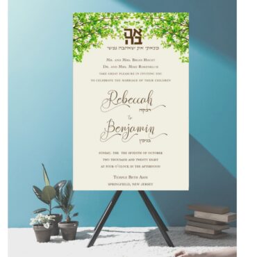 Romantic Ahava — Jewish Wedding Invitation A tender, love‑filled invitation design that harmoniously blends tradition with elegance. The centerpiece of this invitation is the Hebrew word “Ahavah” (love), thoughtfully framed by graceful botanical branches — an artistic nod to growth, unity, and natural beauty. The overall layout pairs timeless Jewish symbolism with refined modern aesthetics, making this invitation a heartfelt and meaningful introduction to your wedding celebration.