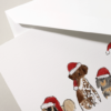 , our Santa Dogs are decked out for the holidays; ready to make spirits bright with every seasonal message you send. Personalize inside with your choice of greeting, font & ink color. Or add a pop of color to the envelope by choosing from our assortment of linings.