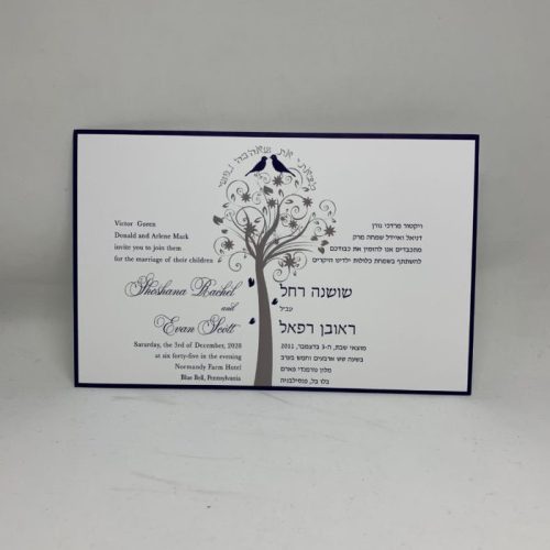 Introducing our unique bilingual Hebrew and English Jewish wedding invitation, elegantly divided with one side in English and the other in Hebrew, framed by a beautiful navy-colored border. In the center of the card, a modern interpretation of the Tree of Life and kissing birds is featured, accompanied by the Hebrew verse "I have found the one whom my soul loves" in an arch design.