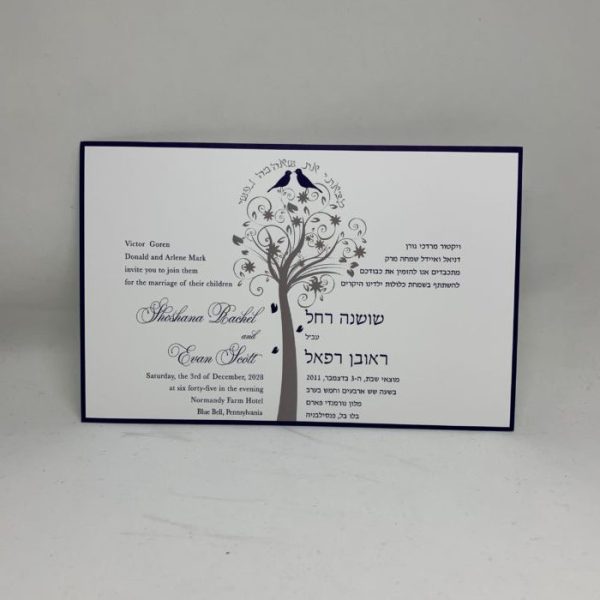 Introducing our unique bilingual Hebrew and English Jewish wedding invitation, elegantly divided with one side in English and the other in Hebrew, framed by a beautiful navy-colored border. In the center of the card, a modern interpretation of the Tree of Life and kissing birds is featured, accompanied by the Hebrew verse "I have found the one whom my soul loves" in an arch design.