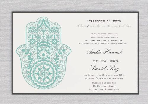 I have found the one whom I love in Hebrew and English for your rustic and organic Jewish wedding invitation, featuring a delightful hand Chamsa or Hamsa design within boughs a charcoal frame. The delicate typeface adds to the overall charm and elegance of the invitation, making it the perfect representation of your love story."