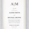 This wedding invitation exudes timeless elegance, blending classic sophistication with modern design. A delicate pearl border frames the card, adding a touch of refinement and grace. At the top, a sleek, contemporary monogram captures the eye, setting the tone for the celebration. The names of the bride and groom are displayed prominently in bold, modern typography, ensuring they stand out beautifully. This harmonious combination of traditional and contemporary elements makes the invitation both elegant and stylish, perfect for couples looking to make a statement of and charm.