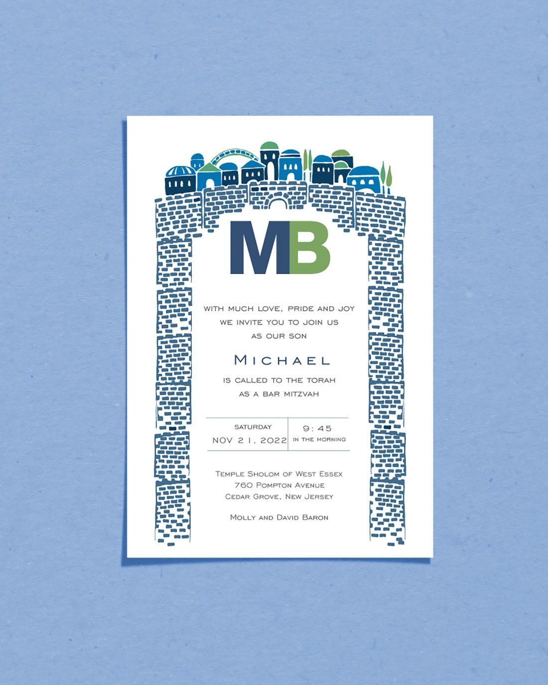Bar Mitzvah invitation card for Alexander featuring a colorful watercolor illustration of the Kotel Western Wall in Jerusalem Israel with Hebrew and English text on white cardstock with navy border