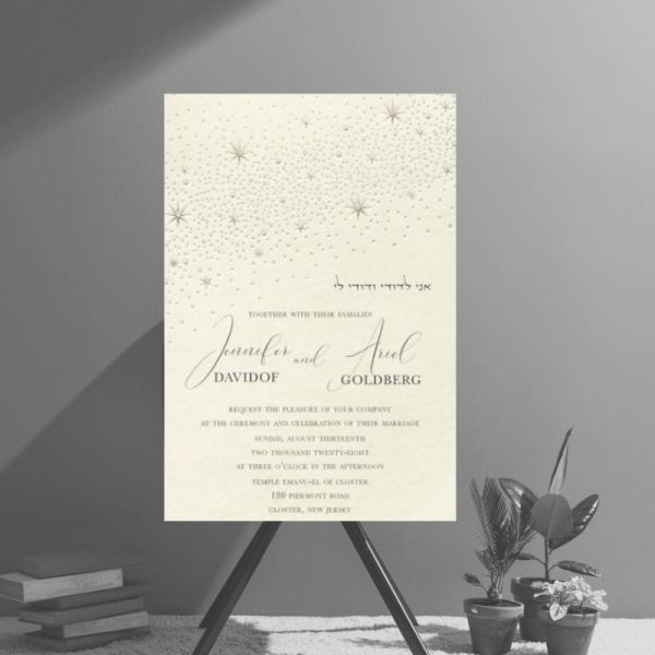 A love that's written in the stars deserves a wedding invitation that sparkles! This invitation features a heavenly view of gold and pearl foil stars above the wording.