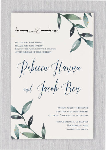 Watercolor leaves accent your personalized wedding details and I am my beloved's and my beloved is mine”  אני לדודי ודודי לי in this Jewish wedding invitation design. The script type treatment used for your wedding information adds to the modern-classic feel of the design.