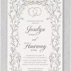 Our opulent Chuppah-inspired Jewish wedding invitation epitomizes sophistication for an upscale affair. Adorned with a border of intertwining leaves in luxurious blue and gold tones, accentuated by a captivating dark smoke pole, it radiates beauty. At its summit, the iconic 'I am my beloved's, and my beloved is mine' (ani ledodi v'dodi li) in Hebrew and English is elegantly depicted as wedding rings. Meanwhile, the names of the bride and groom, meticulously penned in a refined font, further enhance the invitation's unmatched elegance.