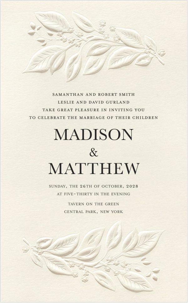 An elegant arrangement of delicate leaves gracefully frames the wording on this stunning botanical garden wedding invitation, featuring a beautifully embossed leaf design at both the top and bottom of the card. The invitation details are centered, featuring modern typography that adds a touch of sophistication and elegance.