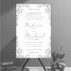 Delicately sketched leaves branches surround your wedding wording, with your names in a stunning pop of font. 