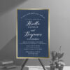 Navy and Gold Foil wedding invitation as romantic as a formal wedding; its foil border gleams against a dark navy background set off by wedding details printed in white ink.