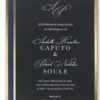 Your initials appear at the top of a wedding invitation as romantic as a formal wedding; its foil border gleams against a dark background set off by wedding details printed in white ink.