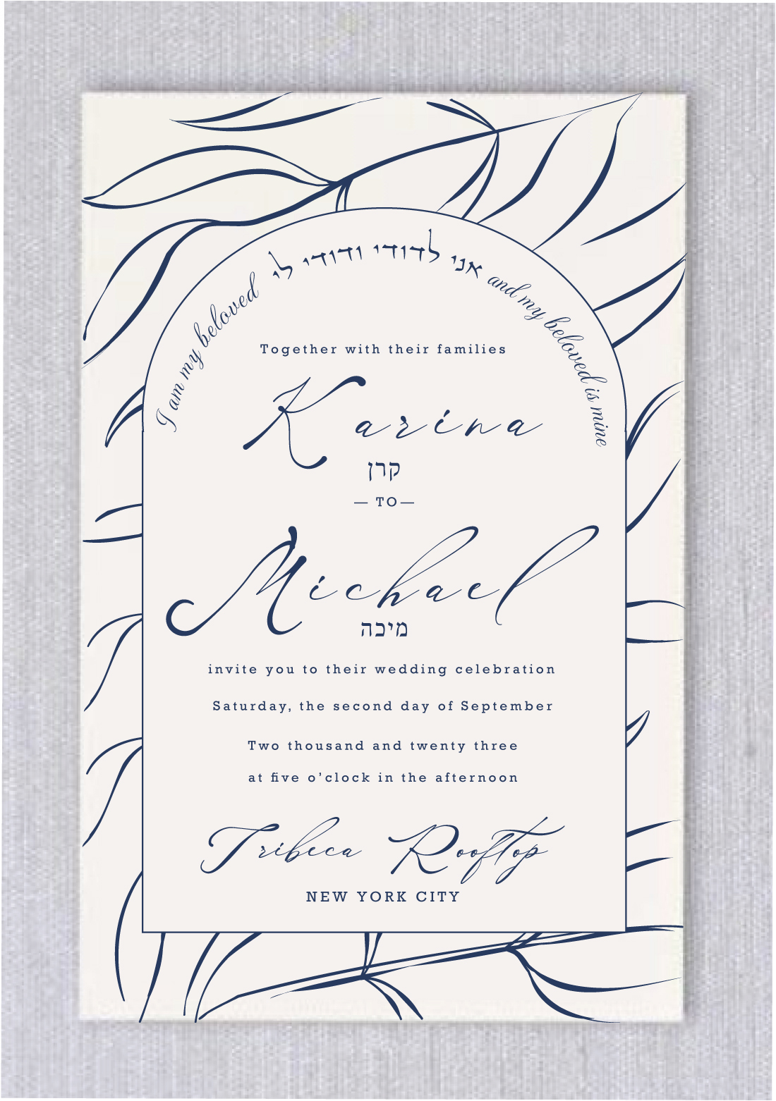 Blowing Leaves Jewish Wedding Invitations is a steadfast favorite in our Jewish wedding collection. Here, we gave it the "Blowing Leaves in Navy" treatment, making it the perfect invitation suite for an elegant, contemporary affair. A heading "I am my beloved and my beloved is mine" in Hebrew and English around the floral border adds a touch of playfulness.