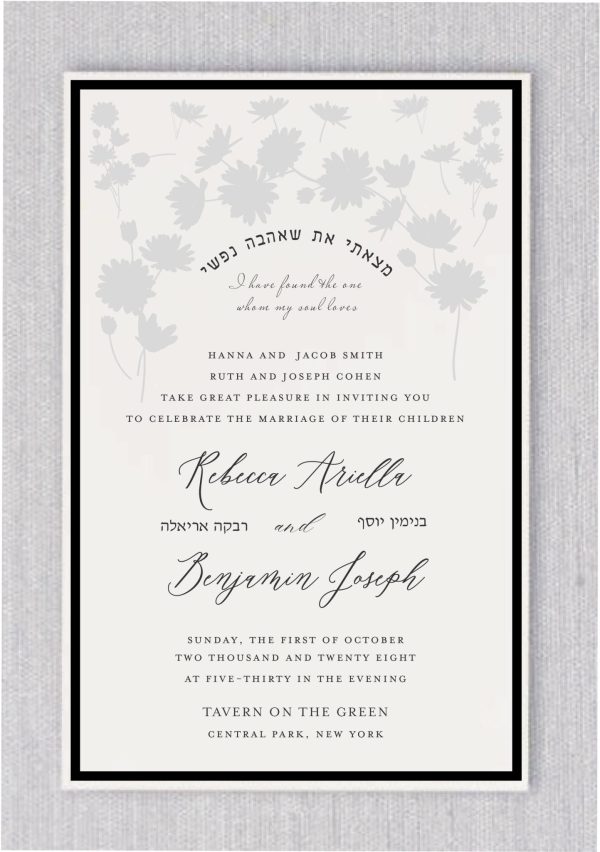 A beautiful and beloved floral design in a very light shade of gray creates an abstract garden of flowers, artistically shaped like a chuppah, placed at the top of the invitation. Beneath this stunning floral arch, the verse from Song of Songs, "I have found the one my soul loves," is written in both Hebrew and English. The Hebrew text is elegantly rendered in an arch, while the English translation appears below it in a refined, classic font. The entire invitation is framed by an elegant black-tie border, adding a touch of sophistication, perfect for a fancy event. The bride and groom's names are prominently displayed in a flowing script font, with their Hebrew names listed underneath in a more formal typeface. The overall design conveys elegance, love, and celebration.