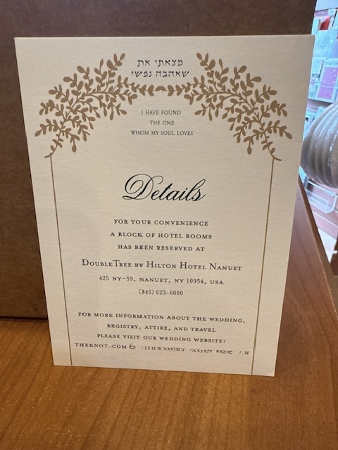 Our stunning Chuppah Jewish wedding invitation is truly one of a kind. Unique and distinct, it features a Chuppah adorned with golden leaves. At the top, the beautiful verse "I have found the one whom my soul loves" is elegantly displayed in both Hebrew and English. The names of the bride and groom are presented in a modern print font, alongside their Hebrew names. This invitation is perfect for celebrating a Jewish wedding.