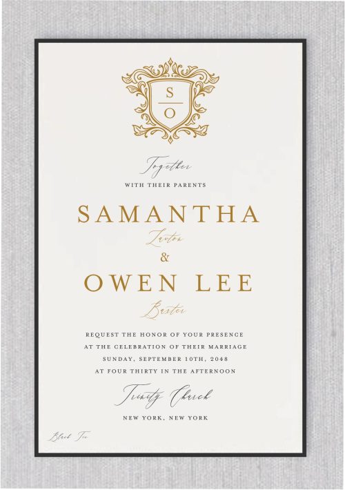 A stunning wedding invitation featuring a beautifully crafted monogram, intricately surrounded by elegant golden leaves that add a touch of nature’s grace. The gold accents shimmer delicately, creating a luxurious and timeless feel. The text, written in contemporary, sleek fonts, contrasts perfectly with the ornate design, ensuring that it stands out clearly and with modern sophistication. This combination of traditional elements with a modern twist creates an invitation that is both refined and striking, capturing the essence of the couple’s style while offering an invitation that is truly memorable and eye-catching.