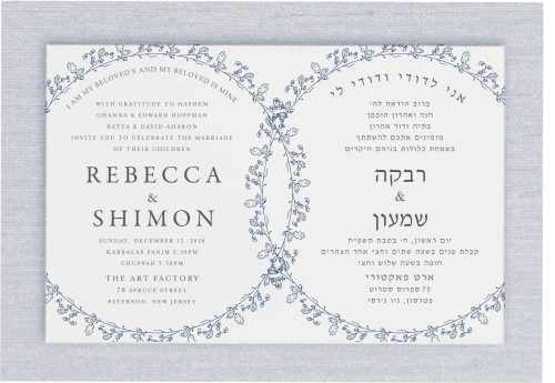 Presenting our Vines Wedding Rings, where two circle etchings elegantly symbolize rings, each intricately inscribed with your wedding details in Hebrew and English. Adorned with a unique vines design, these rings delicately embrace your wedding information, adding a touch of natural beauty to your invitation. Your names are showcased prominently in a sophisticated, elegant typeface, reflecting your refined style. At the top of the card, the beloved phrase "I am my beloved's and my beloved is mine" is artfully displayed in both Hebrew and English, infusing your invitation suite with heartfelt sentiment.