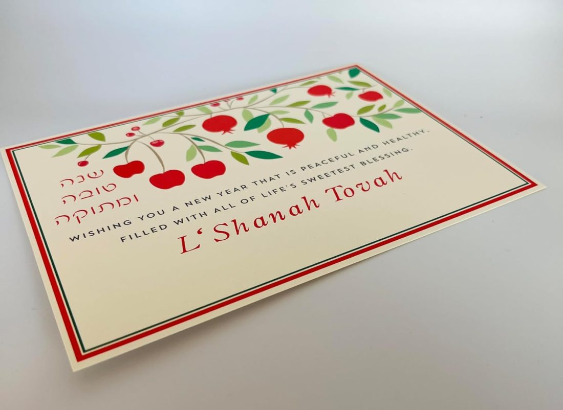 Celebrate the joyous occasion of Rosh Hashanah, the Jewish New Year, with our vibrant and festive Apple and Leaves Rosh Hashanah Cards! Each set includes 5 beautifully designed cards and 5 matching Ecru envelopes. At the top of each card, you'll find intricately illustrated apple branches, bursting with color and rich symbolism, and leaving room for your personal message to family and friends. These bright and striking images represent blessings, abundance, and the sweetness of the upcoming year, perfectly capturing the spirit of Rosh Hashanah with their eye-catching designs. Send a distinctive, high-quality card that stands out and will be cherished by your loved ones. Size: 5″ x 7″ (Flat Card) Printed On: Luxurious 130 lb heavy cardstock Made In: 100% in America Included: 5 cards and 5 corresponding envelopes.