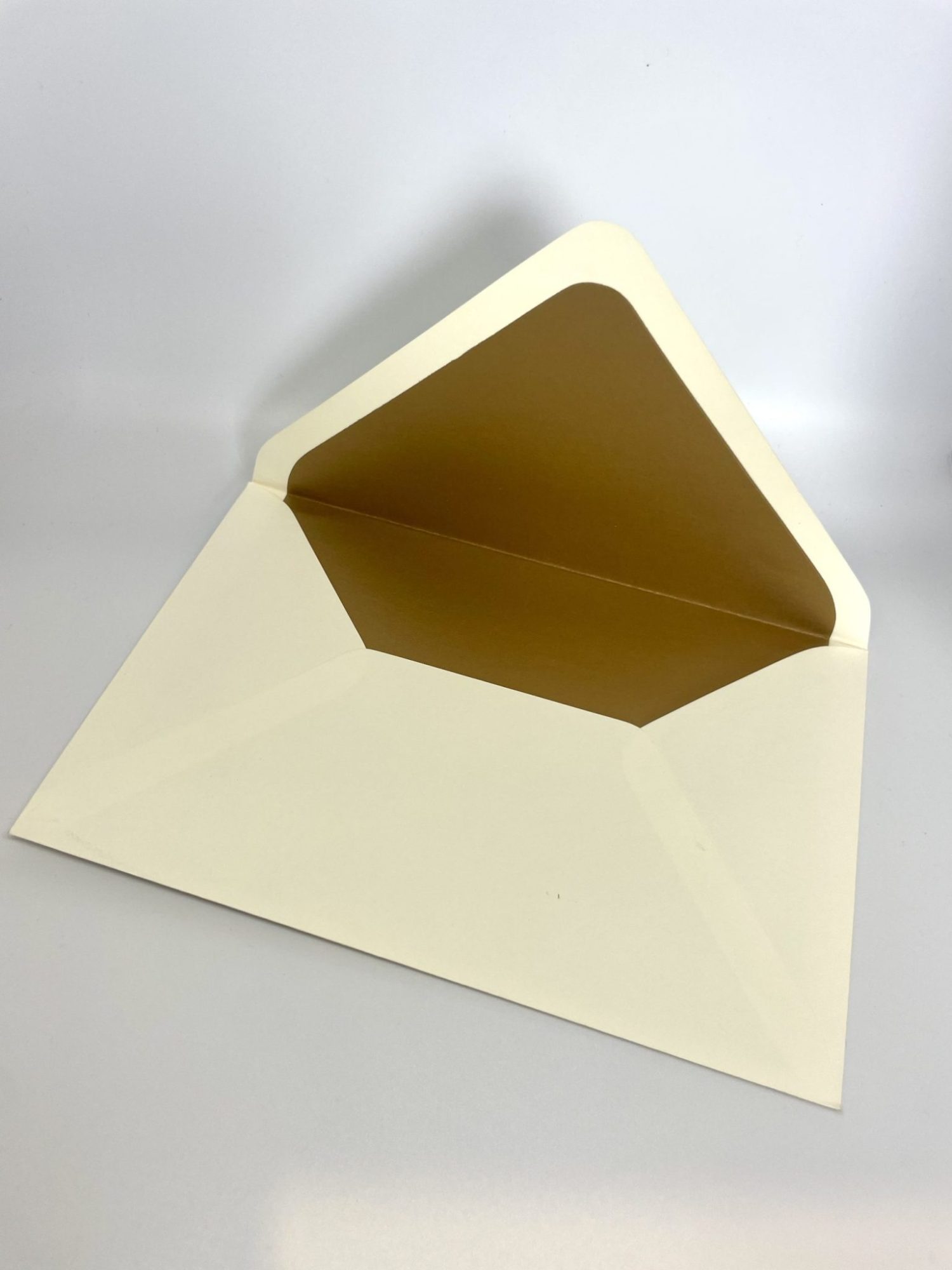 Not satisfied with the envelope you received or printed your invitation elsewhere? You're in the right place! At Cohen Printing, we offer premium envelope upgrades that will elevate your invitations. Our prices include the cost of the envelopes, ensuring transparency and value. Here’s what sets our envelopes apart: 80lb Mohawk Envelopes: We use these high-quality envelopes with a classic Euro flap, providing both a sophisticated look and durability. Hand-Lined Envelopes: Unlike many companies, we hand-line each envelope to order—we don’t buy pre-lined envelopes from the mill. This personal touch ensures a refined and luxurious finish. Real Paper Lining: Our lined envelopes are crafted from genuine colored paper, not a printed background. Many other companies use 20lb white paper and print a color onto it, which can result in a faded, washed-out look. We, on the other hand, source vibrant, high-quality colored paper that provides a richer, deeper color and a more durable, luxurious finish.