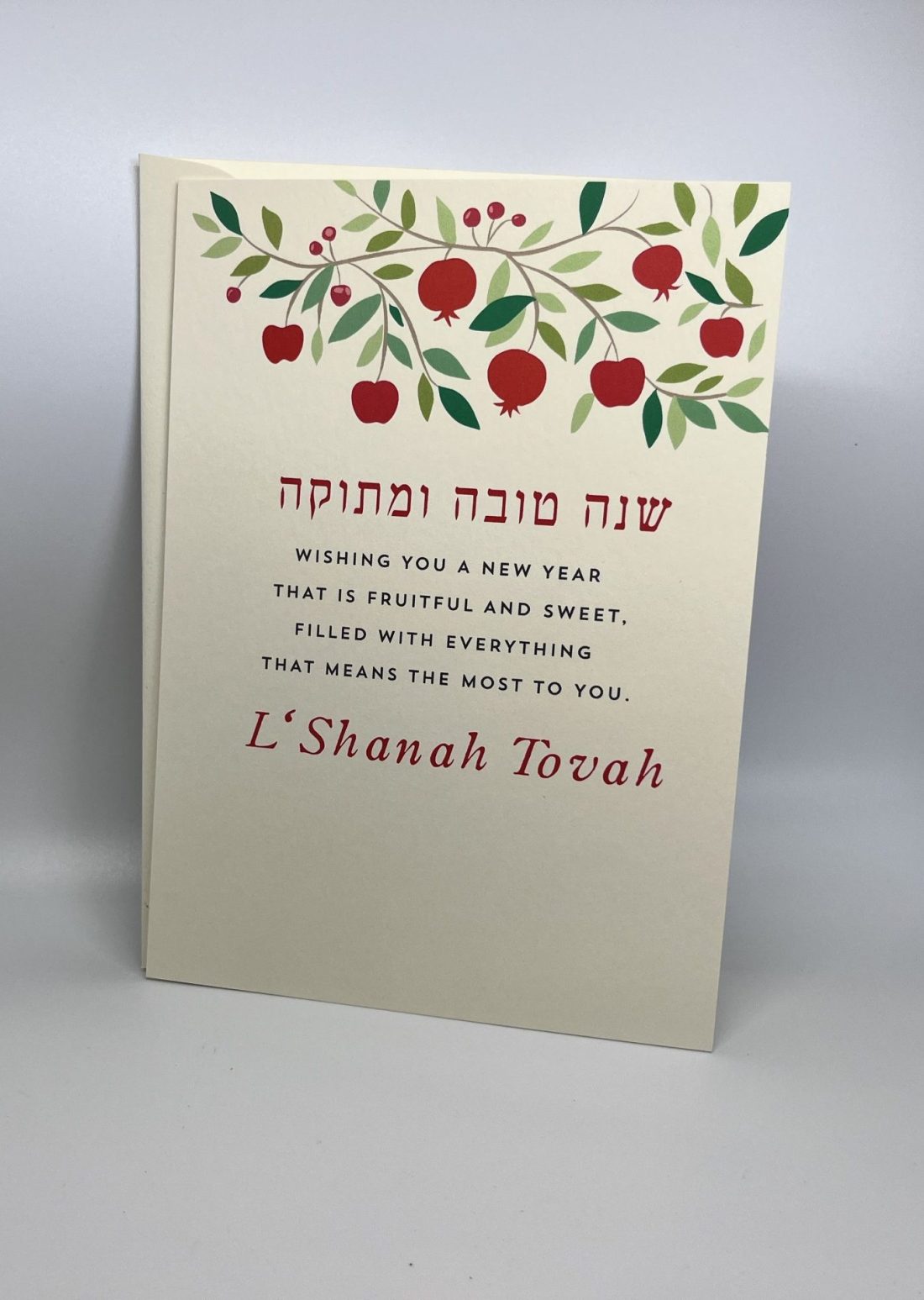 Embrace the spirit of the red Apple Jewish New Year with our beautifully designed Shining Pomegranate greeting cards. Each card features a heartfelt message while providing space for your personal wishes. Instead of printing your name, you can add your own unique message, making each card truly special. Share joy and warmth with your loved ones this Rosh Hashanah and spread the blessings of the Jewish New Year!