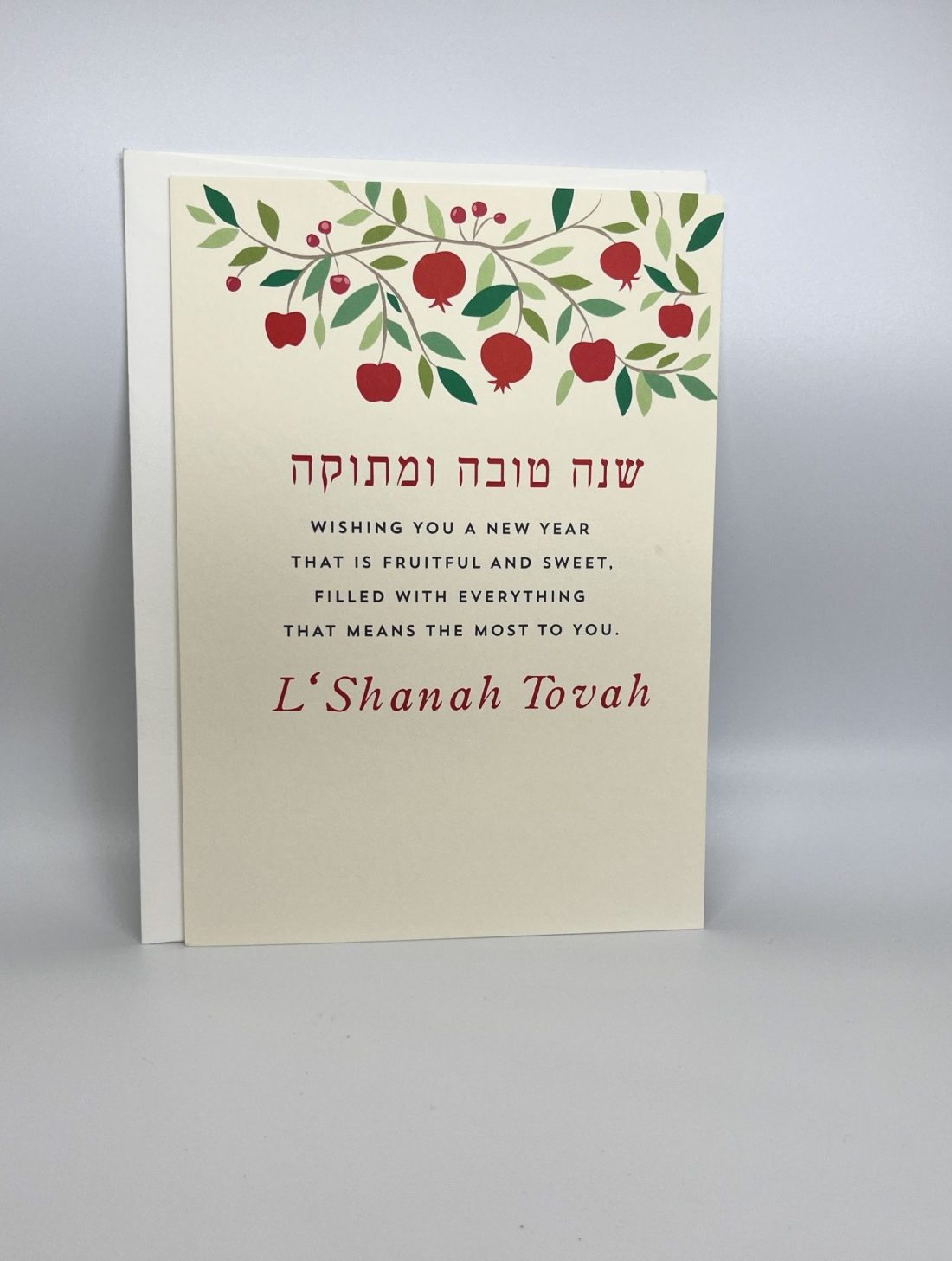 Embrace the spirit of the red Apple Jewish New Year with our beautifully designed Shining Pomegranate greeting cards. Each card features a heartfelt message while providing space for your personal wishes. Instead of printing your name, you can add your own unique message, making each card truly special. Share joy and warmth with your loved ones this Rosh Hashanah and spread the blessings of the Jewish New Year!
