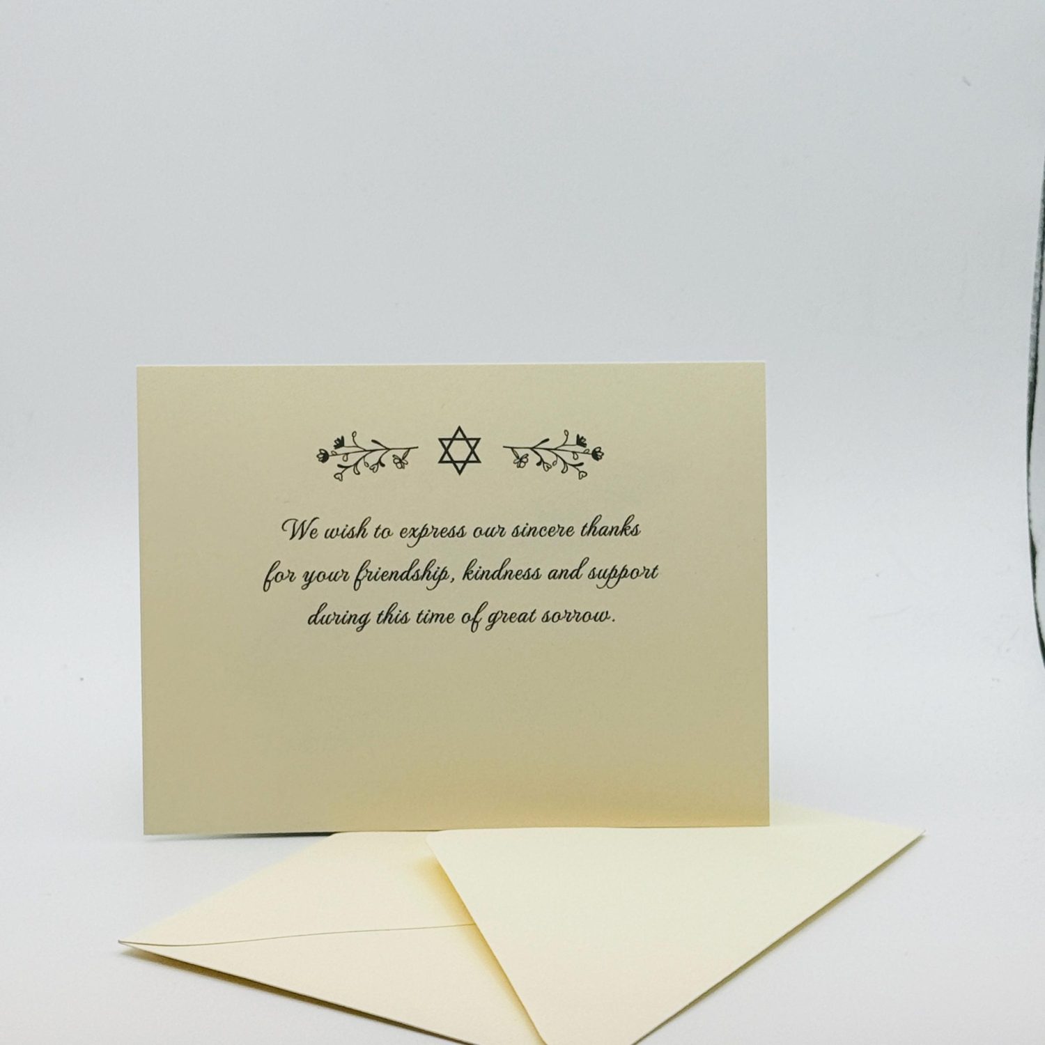 Our unique sympathy card is designed to offer comfort and support during difficult times. The elegant floral Star of David adorns the front, conveying a heartfelt message while leaving space for your personal note to family and friends.