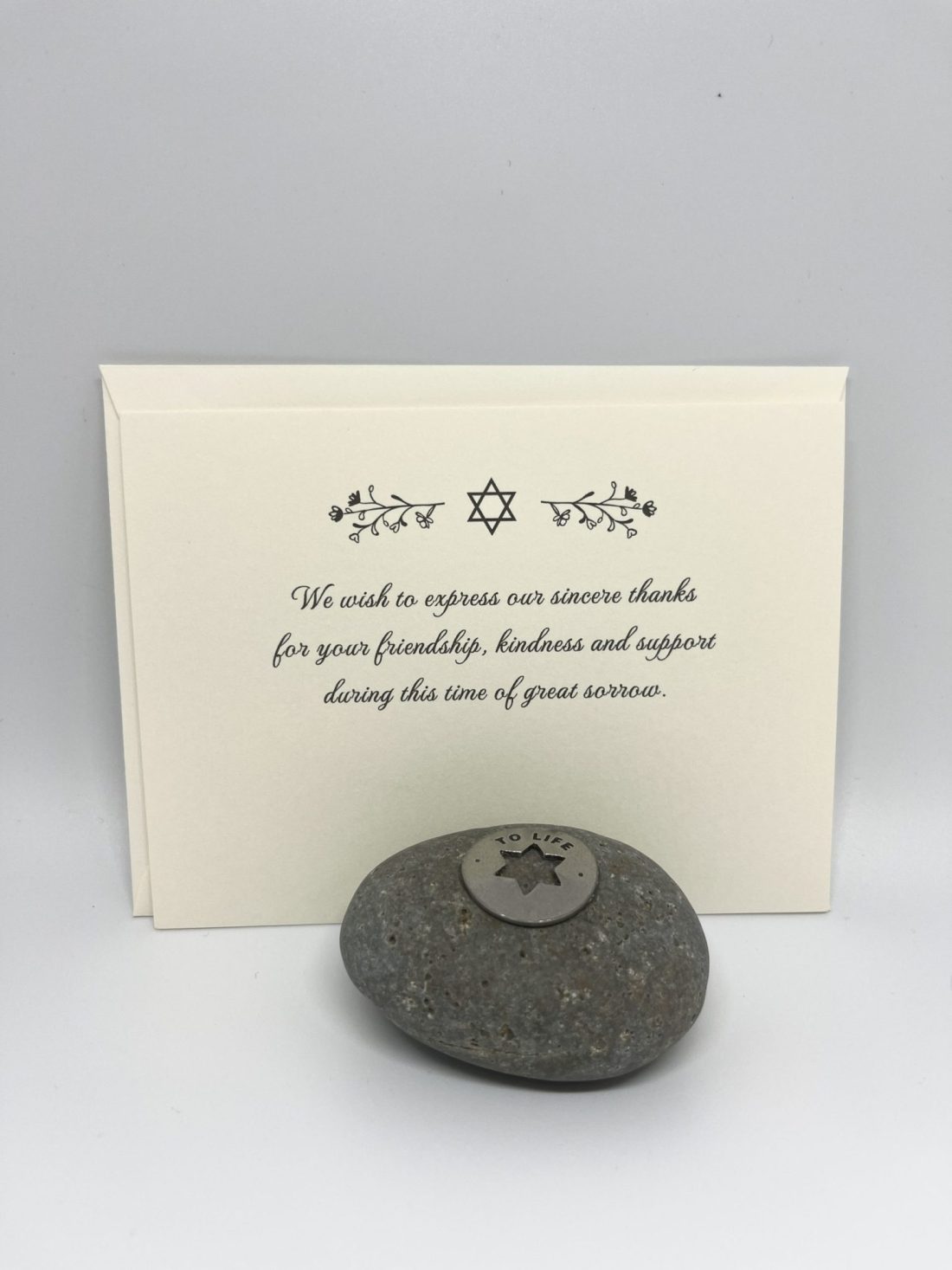 Our unique sympathy card is designed to offer comfort and support during difficult times. The elegant floral Star of David adorns the front, conveying a heartfelt message while leaving space for your personal note to family and friends. Each card comes with a stylish euro flap envelope, adding an extra touch of elegance and appreciation for those who stand by you. A thoughtful way to express gratitude and share your feelings during times of loss.