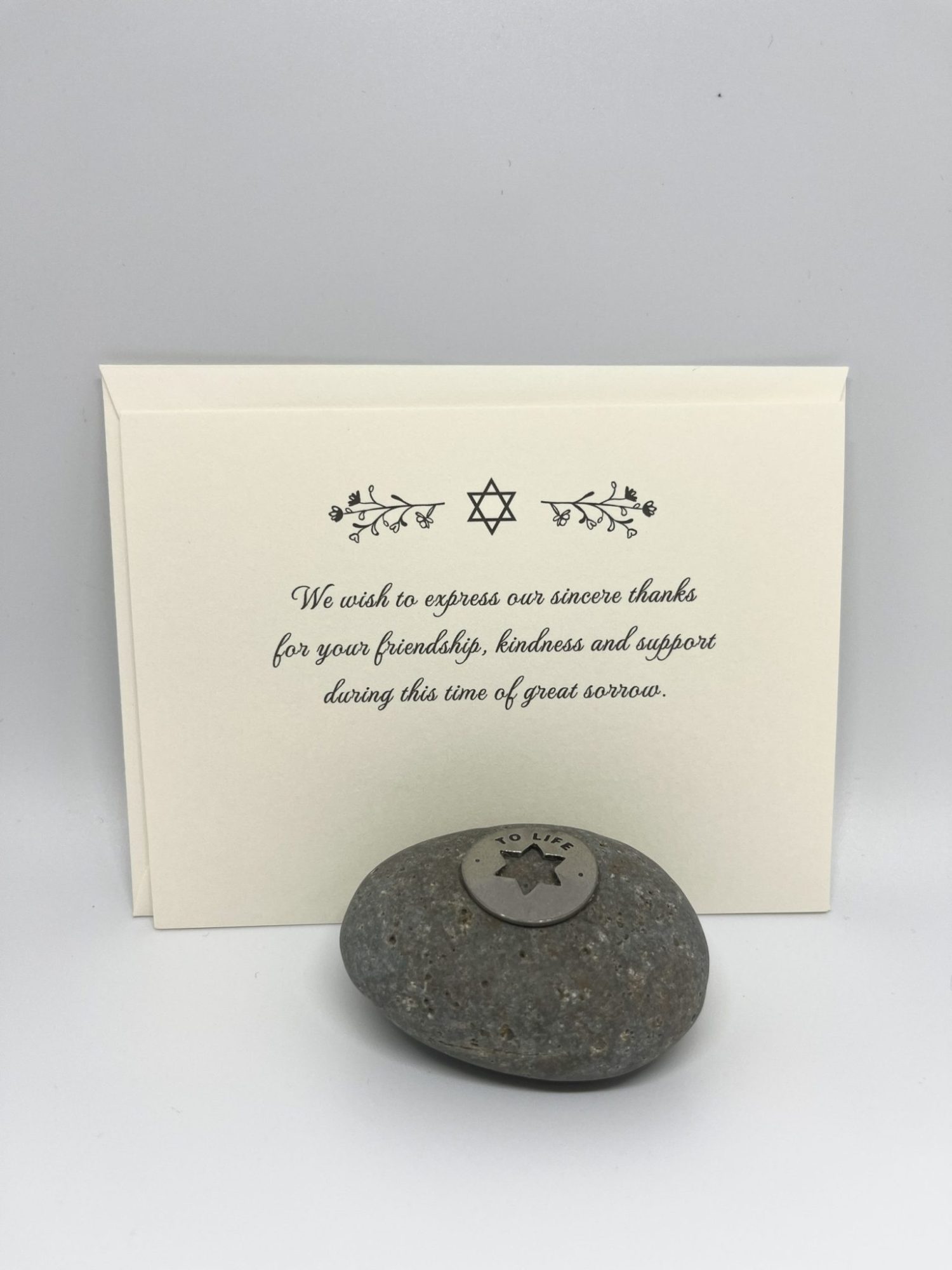 Our unique sympathy card is designed to offer comfort and support during difficult times. The elegant floral Star of David adorns the front, conveying a heartfelt message while leaving space for your personal note to family and friends. Each card comes with a stylish euro flap envelope, adding an extra touch of elegance and appreciation for those who stand by you. A thoughtful way to express gratitude and share your feelings during times of loss.