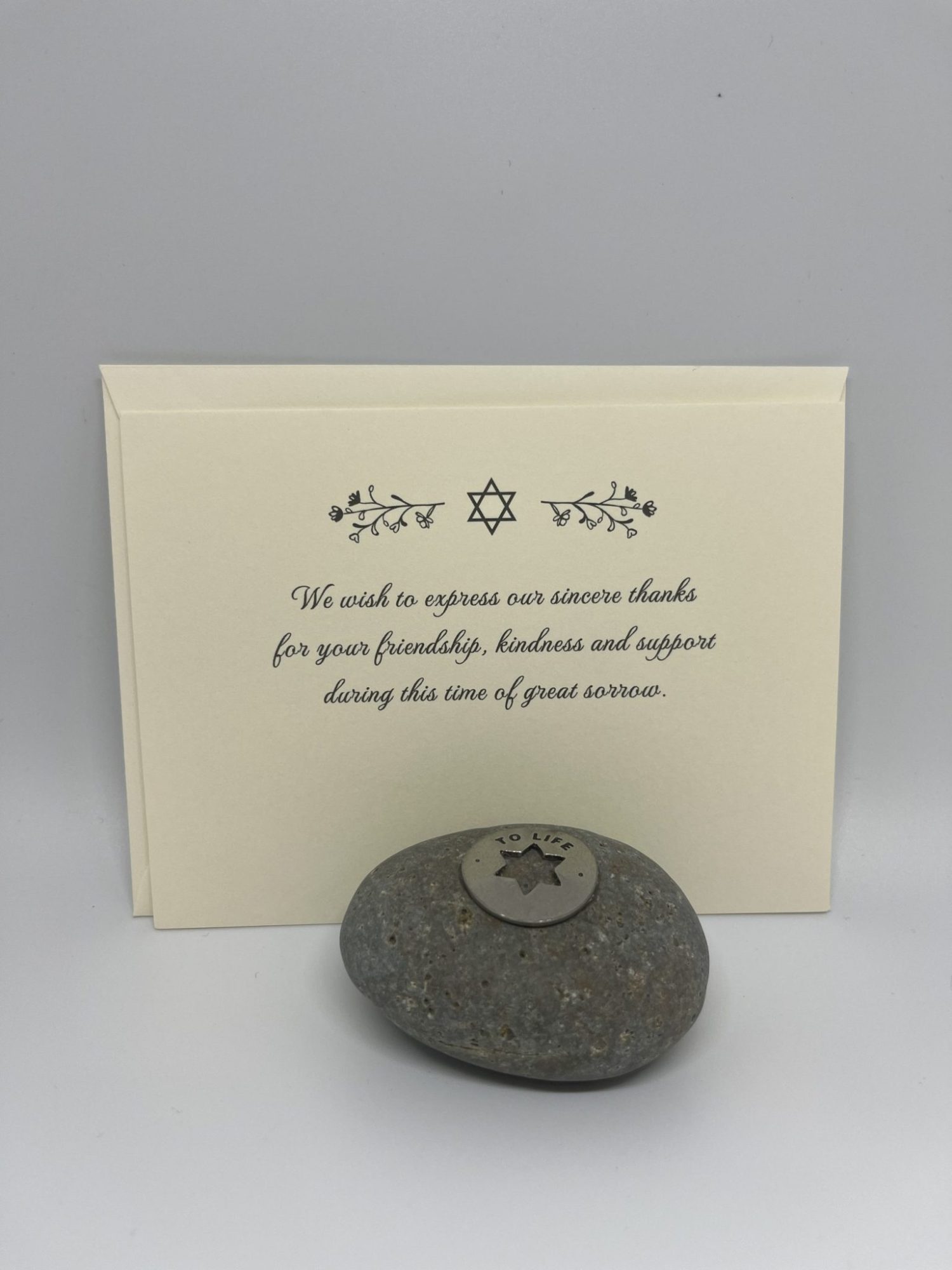 Our unique sympathy card is designed to offer comfort and support during difficult times. The elegant floral Star of David adorns the front, conveying a heartfelt message while leaving space for your personal note to family and friends. Each card comes with a stylish euro flap envelope, adding an extra touch of elegance and appreciation for those who stand by you. A thoughtful way to express gratitude and share your feelings during times of loss.