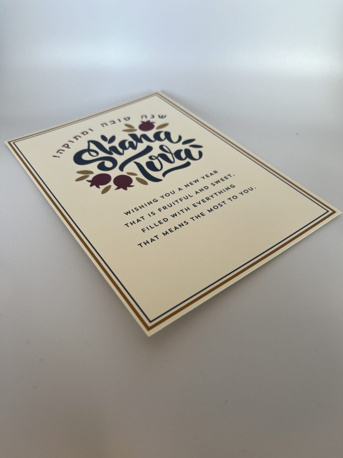 Embrace the spirit of the Pomegranate Jewish New Year with our beautifully designed Shining Pomegranate greeting cards. Each card features a heartfelt message while providing space for your personal wishes. Instead of printing your name, you can add your own unique message, making each card truly special. Share joy and warmth with your loved ones this Rosh Hashanah and spread the blessings of the Jewish New Year!