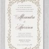This Leafhaven Wedding Invitation features a stunning leaf border in unique ink, with your names displayed in a distinctive staggered layout. The remaining details are elegantly presented in a classic sans-serif font.