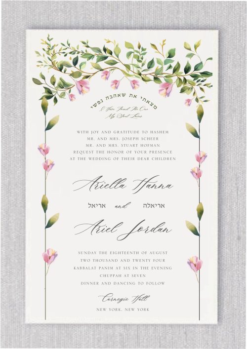 Presenting the Chuppah in Bloom Jewish wedding invitation, a unique design that elegantly features the timeless phrase, “I found the one my soul loves,” in both Hebrew and English within a graceful arch. This stunning design is accentuated by a Chuppah adorned with delicate watercolor flowers and leaves, symbolizing the sacred spirit of the Chuppah ceremony. Perfect for modern couples, this invitation beautifully merges tradition with contemporary artistry. The flowing script highlights the essential wedding details with sophisticated simplicity. The couple's Hebrew names, thoughtfully integrated with the elegant English text, add a personal touch, making this invitation the perfect choice for a meaningful and memorable Jewish celebration.