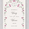 This enchanting Hora Under the Chuppah Birkat Hamazon Bencher Folder is elegantly framed by the vibrant symbolism of colorful watercolor florals. Surrounding the chuppah, the lush leaves and delicate blooms are thoughtfully illustrated, creating a stunning visual representation of nature’s beauty. At the top of the folder, the timeless phrase, “I found the one my soul loves,” is elegantly presented in both Hebrew and English, seamlessly integrated into the shape of wedding rings. The design is further enhanced by the Chuppah, adorned with delicate watercolor flowers, symbolizing the sacred spirit of the Chuppah ceremony.