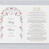 This enchanting Hora Under the Chuppah Birkat Hamazon Bencher Folder is elegantly framed by the vibrant symbolism of colorful watercolor florals. Surrounding the chuppah, the lush leaves and delicate blooms are thoughtfully illustrated, creating a stunning visual representation of nature’s beauty. At the top of the folder, the timeless phrase, “I found the one my soul loves,” is elegantly presented in both Hebrew and English, seamlessly integrated into the shape of wedding rings. The design is further enhanced by the Chuppah, adorned with delicate watercolor flowers, symbolizing the sacred spirit of the Chuppah ceremony.
