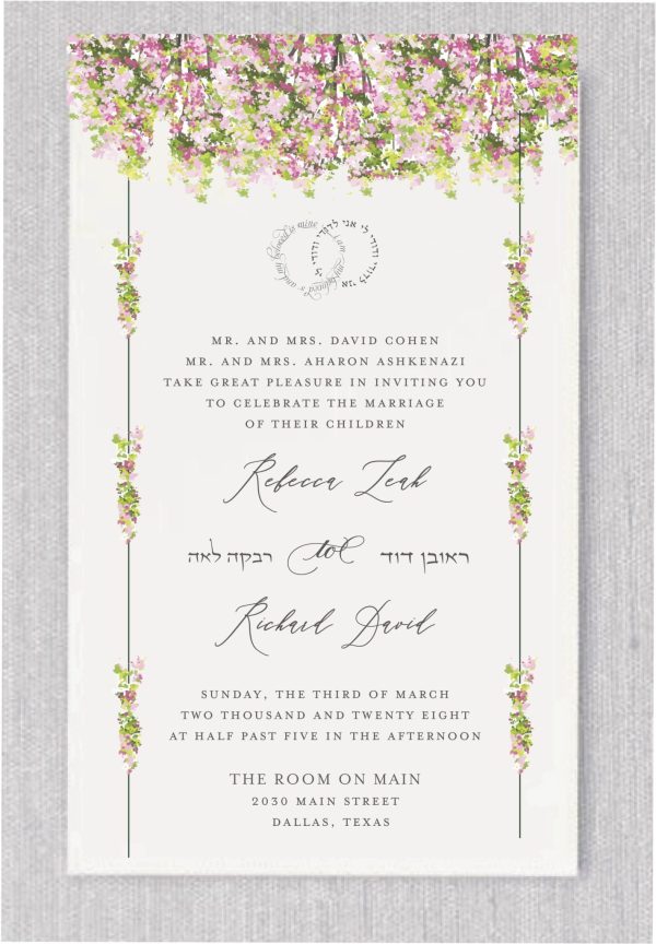 his watercolor Chuppah, bathed in shades of delicate greenery, forms the heart of this enchanting design. At its core, the cherished verse, “I am my beloved’s and my beloved is mine,” is gracefully displayed in both Hebrew and English, encircled by the timeless symbolism of wedding rings beneath the Chuppah. The names of the bride and groom, beautifully presented in both languages, adorn the invitation, transforming it into a true masterpiece of elegance and sophistication.