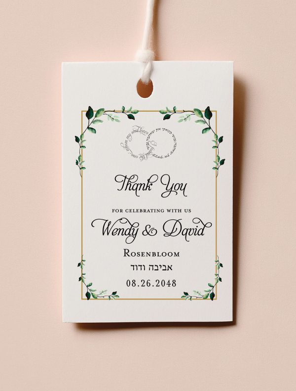 Add a meaningful touch to your simcha with our custom Jewish Wedding Favor Tags. This elegant design features two interlocking wedding rings at the top, encircling the classic "I am my beloved's and my beloved is mine" verse in both Hebrew and English. Below the "Thank You for celebrating with us" message, your names are printed in a beautiful script alongside your Hebrew names and wedding date. Framed by a delicate botanical floral border, these high-quality Jewish Gift Tags are the perfect way to personalize your event giveaways.