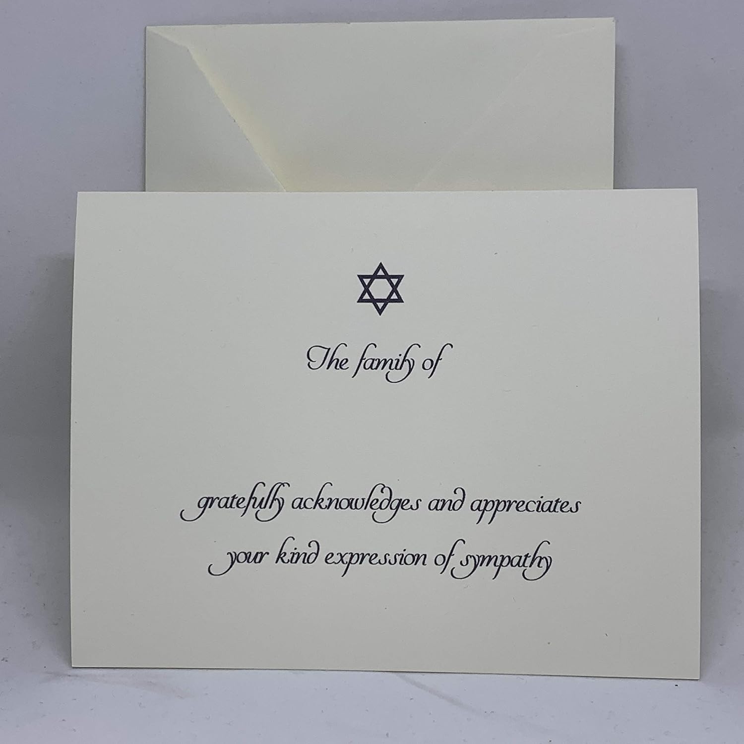Our Jewish Sympathy Thank You Cards provide a dignified and meaningful way to acknowledge the support of friends and family. This design features a classic Star of David paired with an elegant script that reads, "The family of gratefully acknowledges and appreciates your kind expression of sympathy." Each card is printed on our signature 130lb. premium heavy ecru cardstock using professional presses for a high-end, tactile feel. These are flat note cards that allow you to write the name of the departed and any personal notes on the front or back.