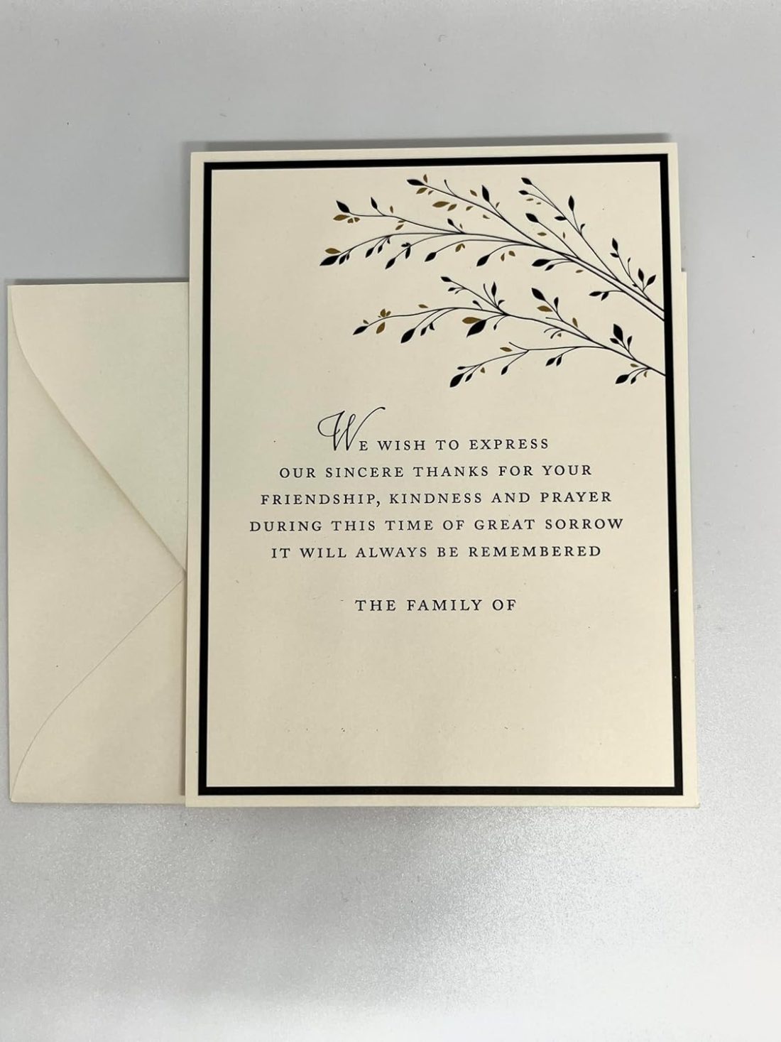 Introducing our stunning Gold leaves branches Sympathy Cards and matching envelopes! These elegant and unique cards are designed to offer a ray of light and support to those facing challenging times. Each card measures 5.5" x 4.25" and is crafted from high-quality 130lb paper, providing a smooth texture and substantial weight for a truly premium feel. Our printing process combines digital techniques, resulting in a crisp and vibrant depiction of the beautiful branches in gold and black. The intricate details create a striking visual impact that is sure to resonate with the recipient. Each card offers ample space for your family name and a personal message, making it easy to express your heartfelt sentiments. When you send our cards, your friends will immediately notice the difference. Crafted from high-quality paper and featuring exquisite printing, these are anything but generic greeting cards.