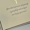 Our Christian Sympathy Thank You Cards provide a graceful and dignified way to acknowledge the kindness of friends and family during a difficult time. This design features a shimmering gold foil cross centered within a sophisticated black border, paired with an elegant script that reads, 