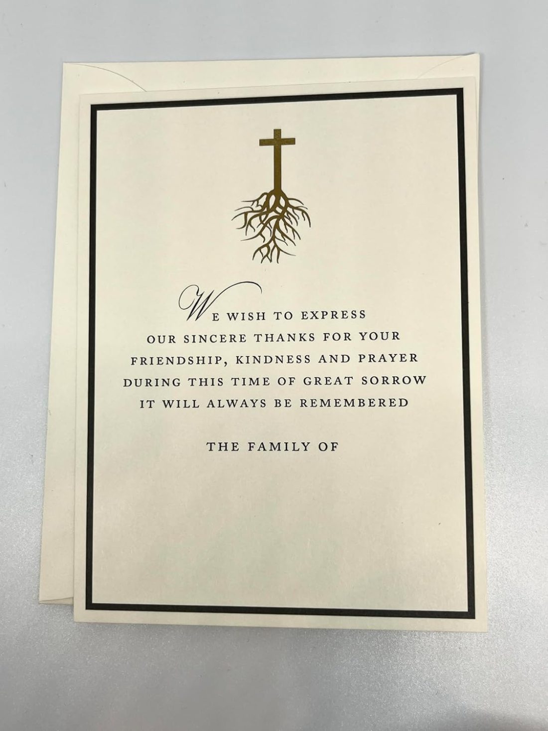 Introducing our Modern Gold Foil Cross Sympathy Cards, thoughtfully designed to offer light and support during difficult times. Featuring a stunning gold foil cross, these condolence cards come with matching envelopes, making them perfect for expressing your heartfelt condolences. Measuring 5.5" x 4.25", each card is crafted from premium 130lb paper for a substantial and luxurious feel. This pack includes 10 cards featuring an elegant black border and 10 euro flap envelopes, perfect for reaching out to multiple individuals or families. Each card offers ample space for your family name and a personal message, making it easy to express your heartfelt sentiments.