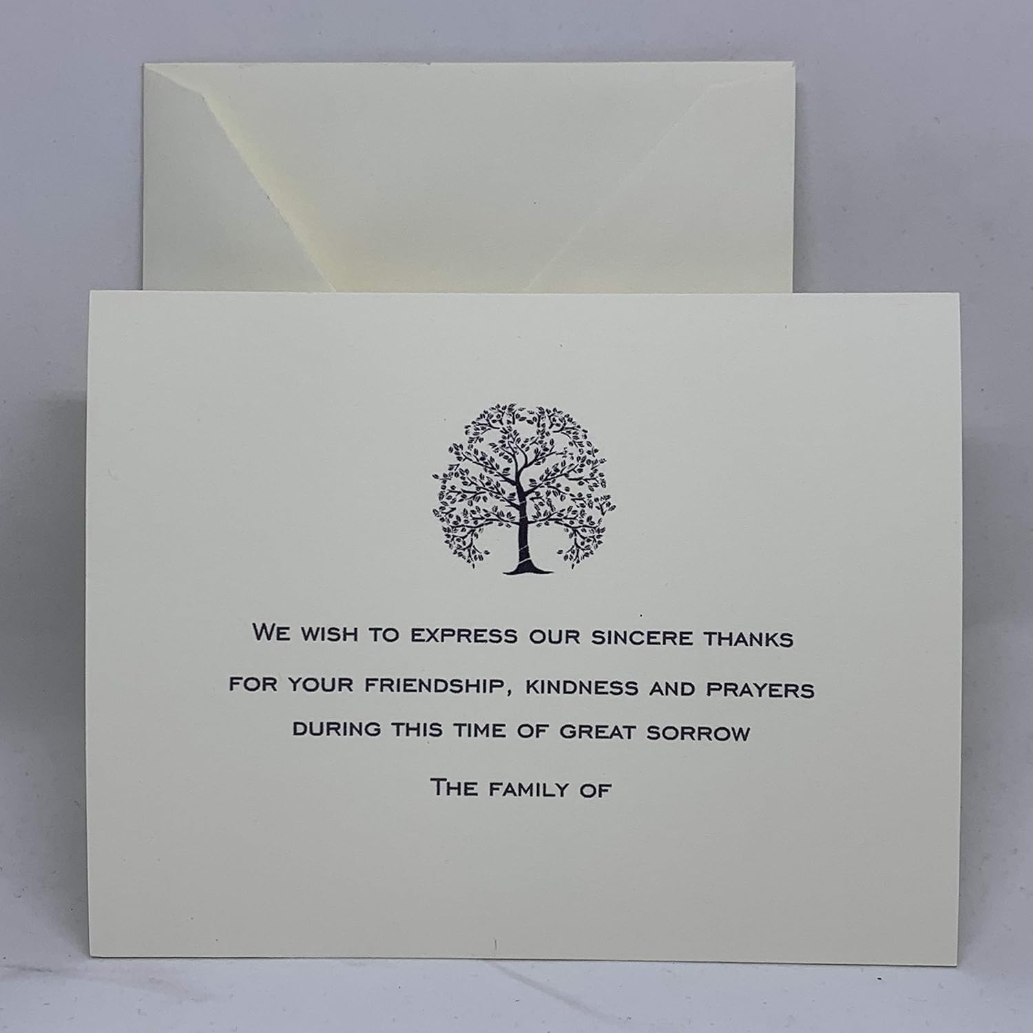 Our Modern Tree of Life Sympathy Thank You Cards offer a peaceful and universal way to express gratitude for the support received during a loss. This design features a detailed Tree of Life illustration centered above a message of sincere appreciation that reads: "We wish to express our sincere thanks for your Friendship, Kindness and Prayers during this time of great sorrow. The Family of" Each card is printed on our signature 130lb. premium heavy ecru cardstock using professional presses for a high-end, tactile feel. These are flat note cards, providing a clean and dignified appearance for your personal acknowledgments.