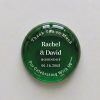A keepsake favor your guests will actually keep. Each glass stone is personalized with your first names, last name, and wedding date, framed by an elegant circular "Thank You so Much / For Celebrating With Us" border.